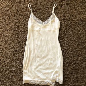 Cotton slip dress with small slit and lacy edges